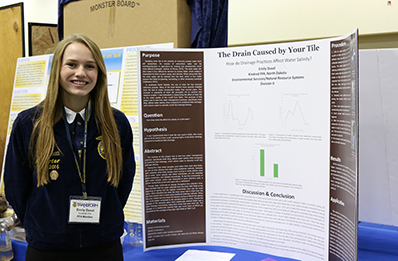 Emily Duval (Kindred) prepares to present her agricultural research project. Duval’s project and research is part of the agricultural education curriculum in North Dakota.